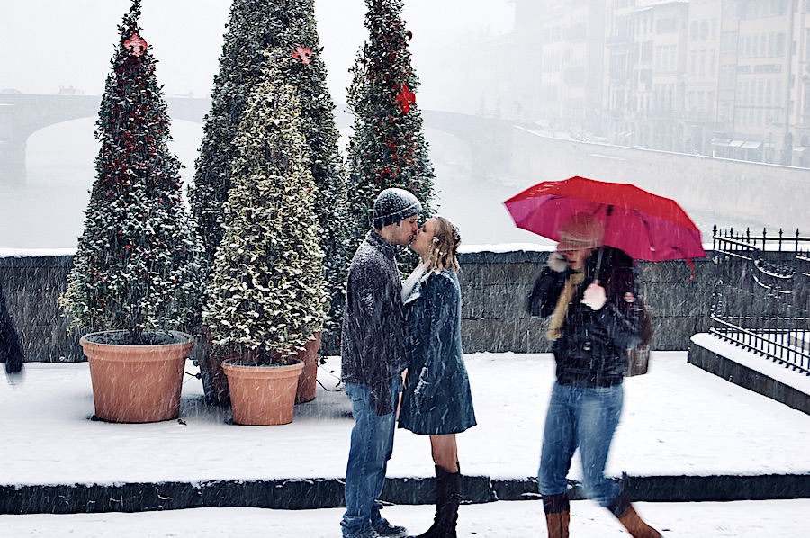 A young couple has a snowy kiss on the Ponte Vecchio snowy-kiss-ponte-vecchio.jpeg
